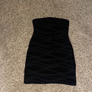 Black strapless stretchy form fitting dress